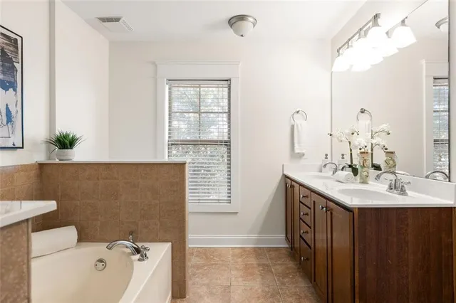 a bathroom with a sink and a bathtub