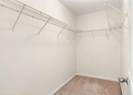 a view of a room with racks on the wall