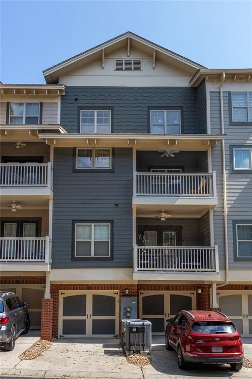 655 Mead Street Southeast, Unit 54 Atlanta, GA 30312 - Photo 24 of 25 a front view of a building with parking space