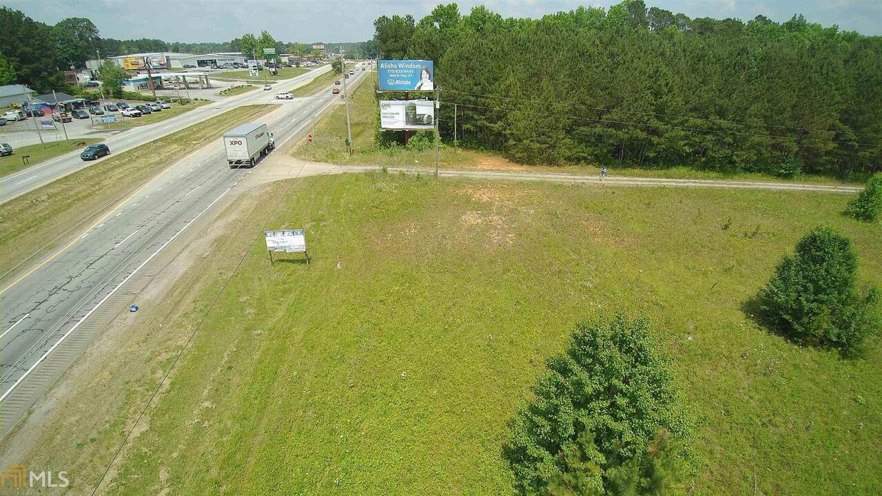 0 Bankhead Highway Carrollton, GA 30116 - Photo 2 of 4 a view of a swimming pool and an outdoor space