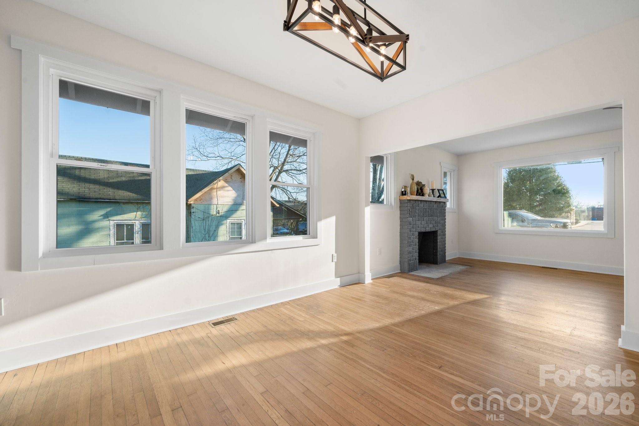 49 8th Street Southeast Hickory, NC 28602 - Photo 12 of 39 a view of an empty room with a window