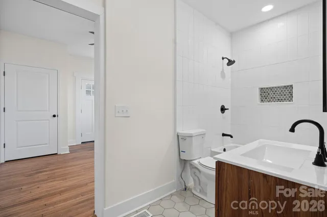 a view of a pathway with a backyard of the house