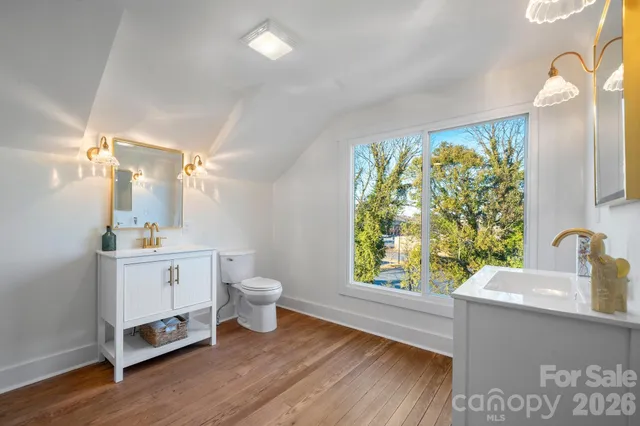 a view of house with outdoor space and sitting area