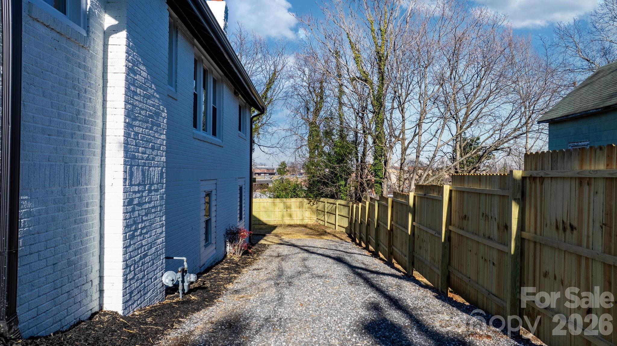 49 8th Street Southeast Hickory, NC 28602 - Photo 32 of 39 a view of a pathway with a backyard of the house