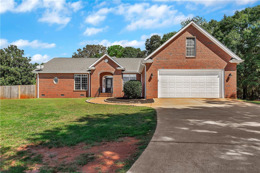 3620 Centerville Road Anderson, SC 29625 - Photo 1 of 49 Classic brick elevation with an attached two-car garage and a wide concrete driveway.