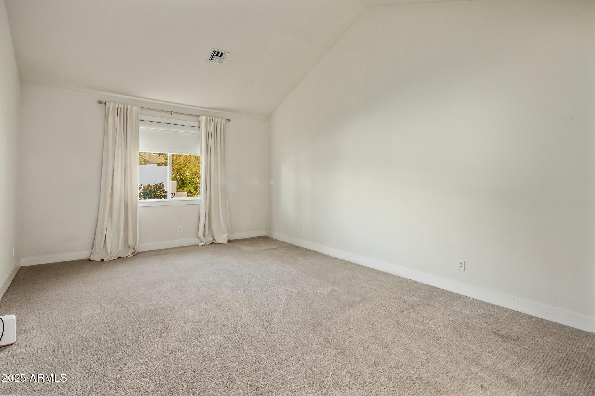 3902 East Fairmount Avenue Phoenix, AZ 85018 - Photo 13 of 32 a view of an empty room and a window