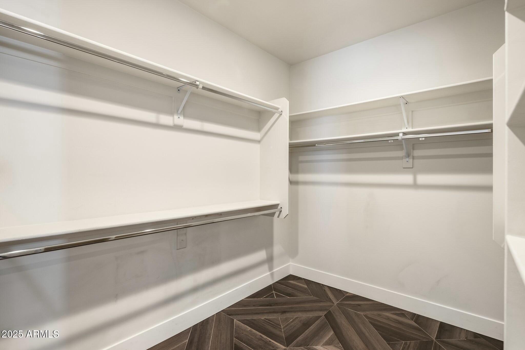 3902 East Fairmount Avenue Phoenix, AZ 85018 - Photo 16 of 32 a view of a room with rack on the wall