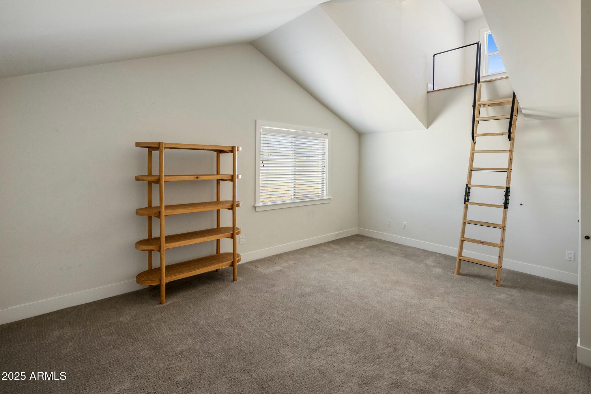 3902 East Fairmount Avenue Phoenix, AZ 85018 - Photo 26 of 32 an empty room with staircase and white walls