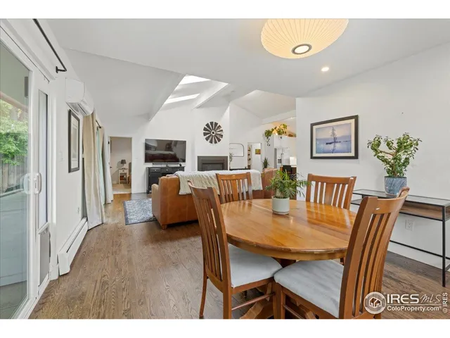 a front view of a house with a garden and patio