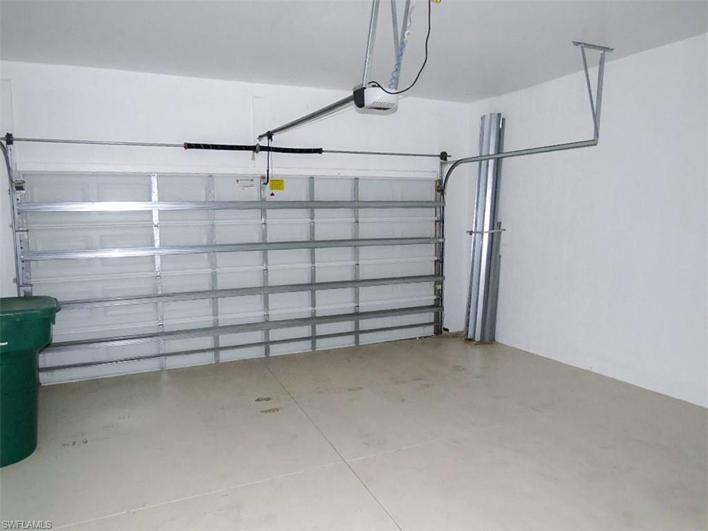 7849 Founders Lane Naples, FL 34104 - Photo 21 of 23 a view of a garage