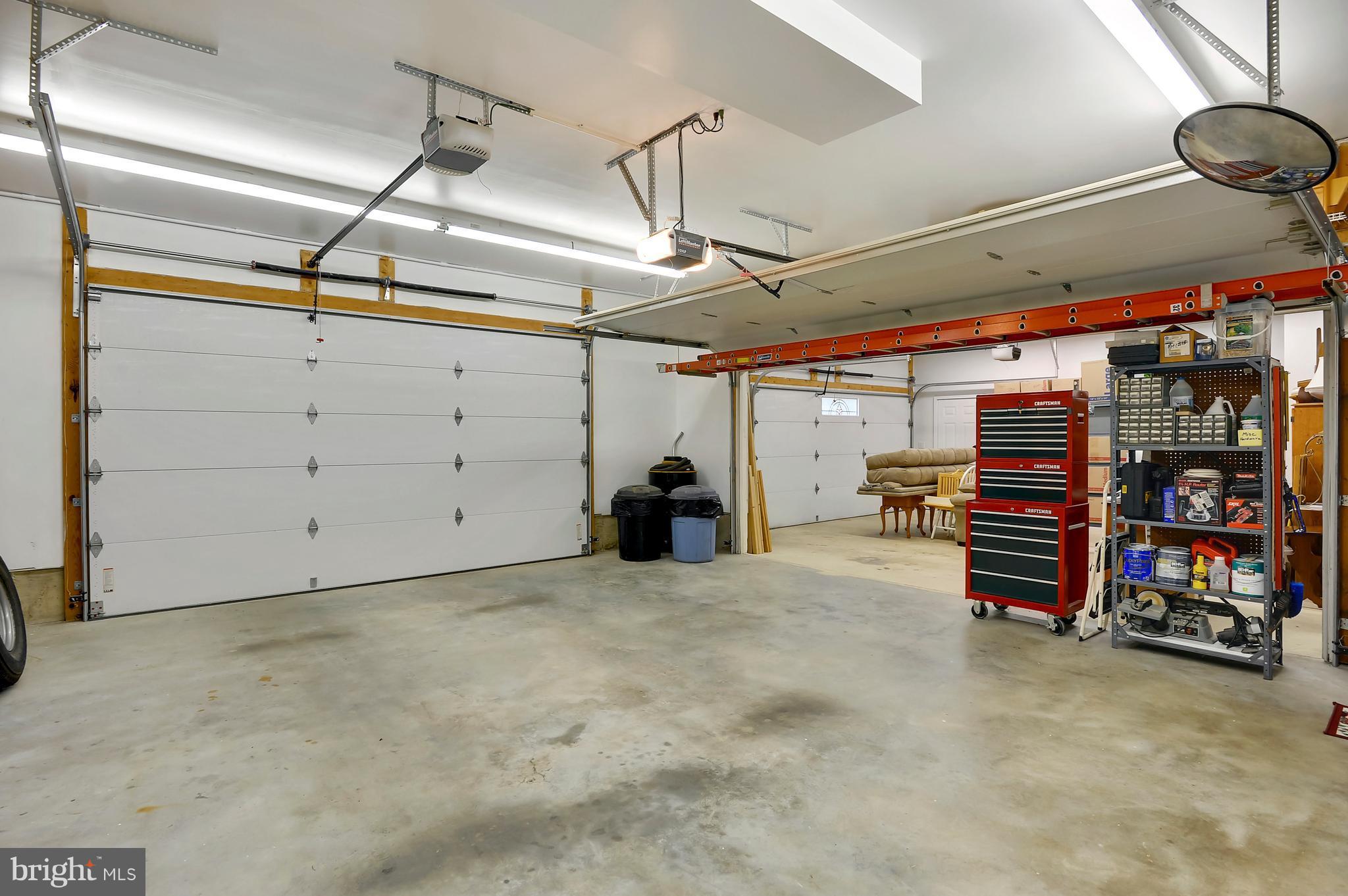 2816 Stinnett Road Huntingtown, MD 20639 - Photo 18 of 27 a view of a room with racks