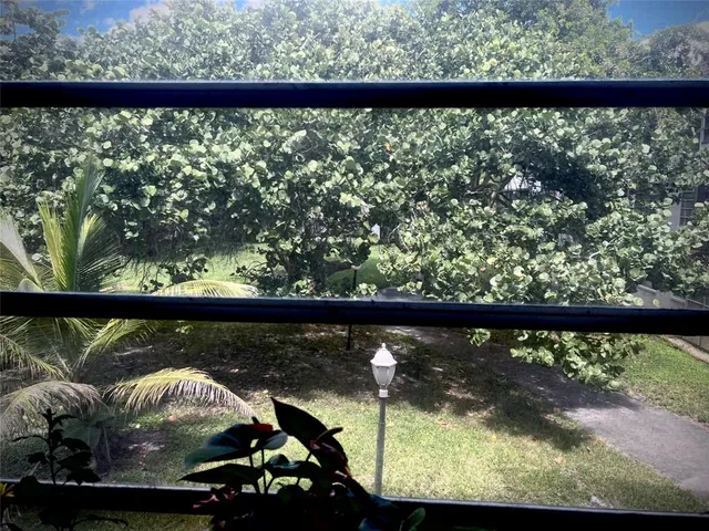 a view of a lake from a balcony