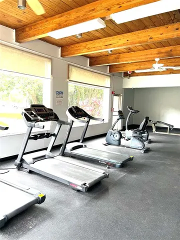 a gym room with gym equipment