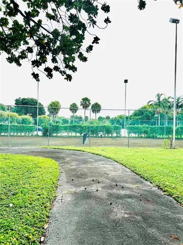 a view of a garden and trees