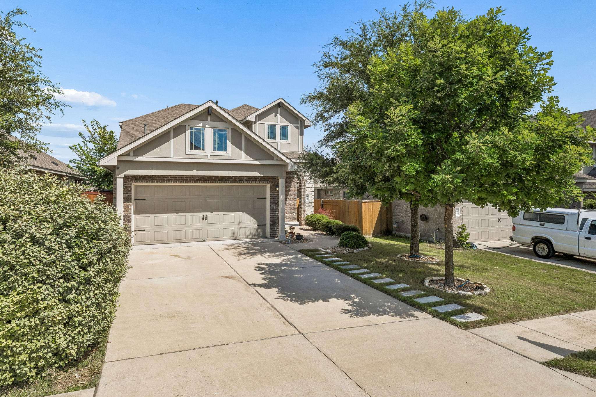 689 Nautical Loop Kyle, TX 78640 - Photo 6 of 34 A welcoming driveway leads to this charming residence with inviting curb appeal.