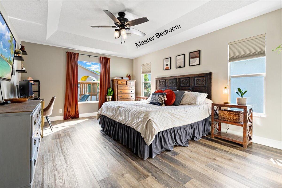 2598 Southwest Impala Way Stuart, FL 34997 - Photo 16 of 60 Master Bedroom