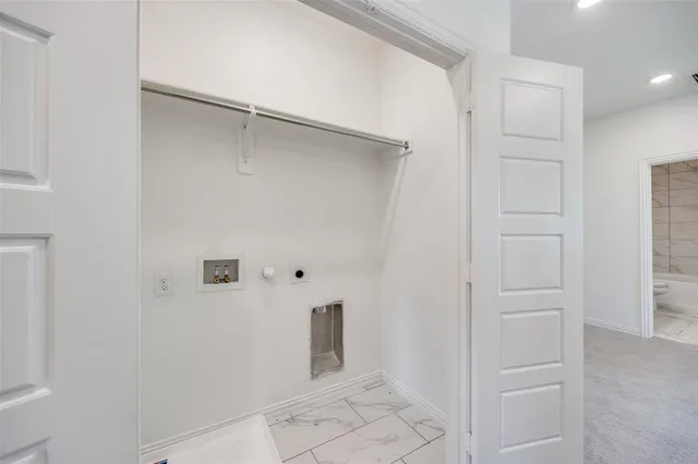 a view of a bathroom with a toilet