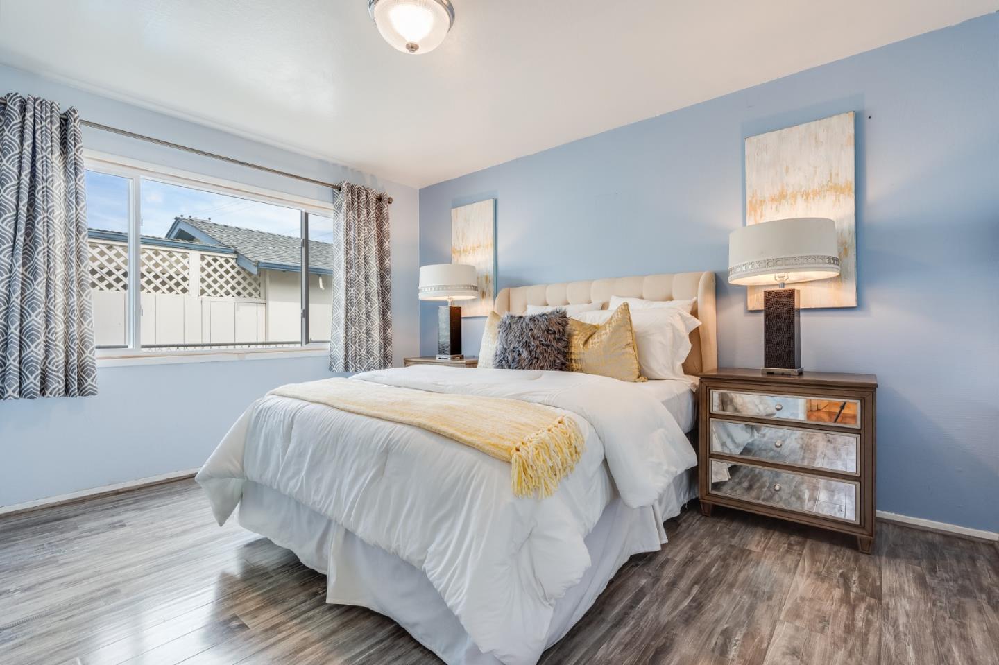 1376 Peralta Road Pacifica, CA 94044 - Photo 16 of 35 a bedroom with a bed and a window