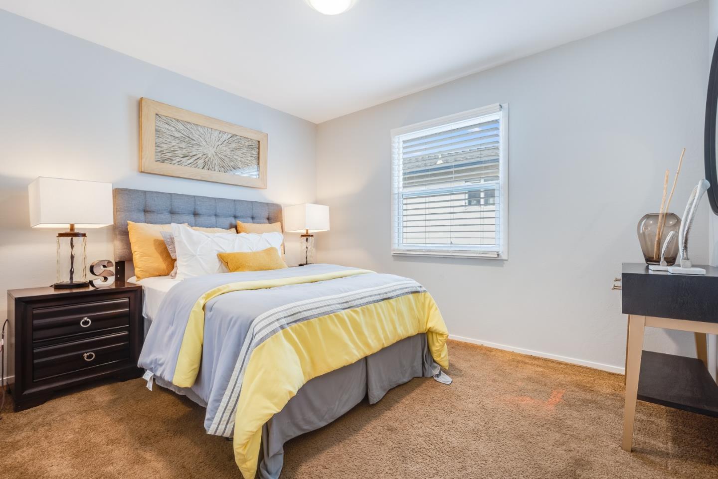 1376 Peralta Road Pacifica, CA 94044 - Photo 19 of 35 a bedroom with a bed and a television