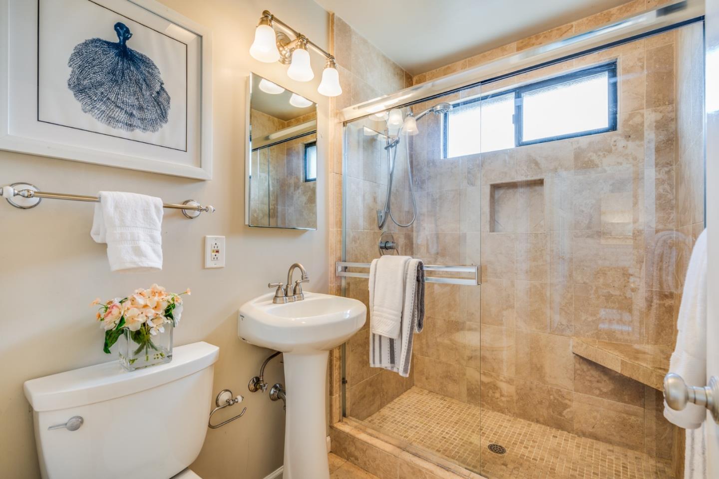 1376 Peralta Road Pacifica, CA 94044 - Photo 21 of 35 a bathroom with a sink toilet and shower