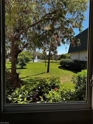 a view of a garden with a lot of flower plants