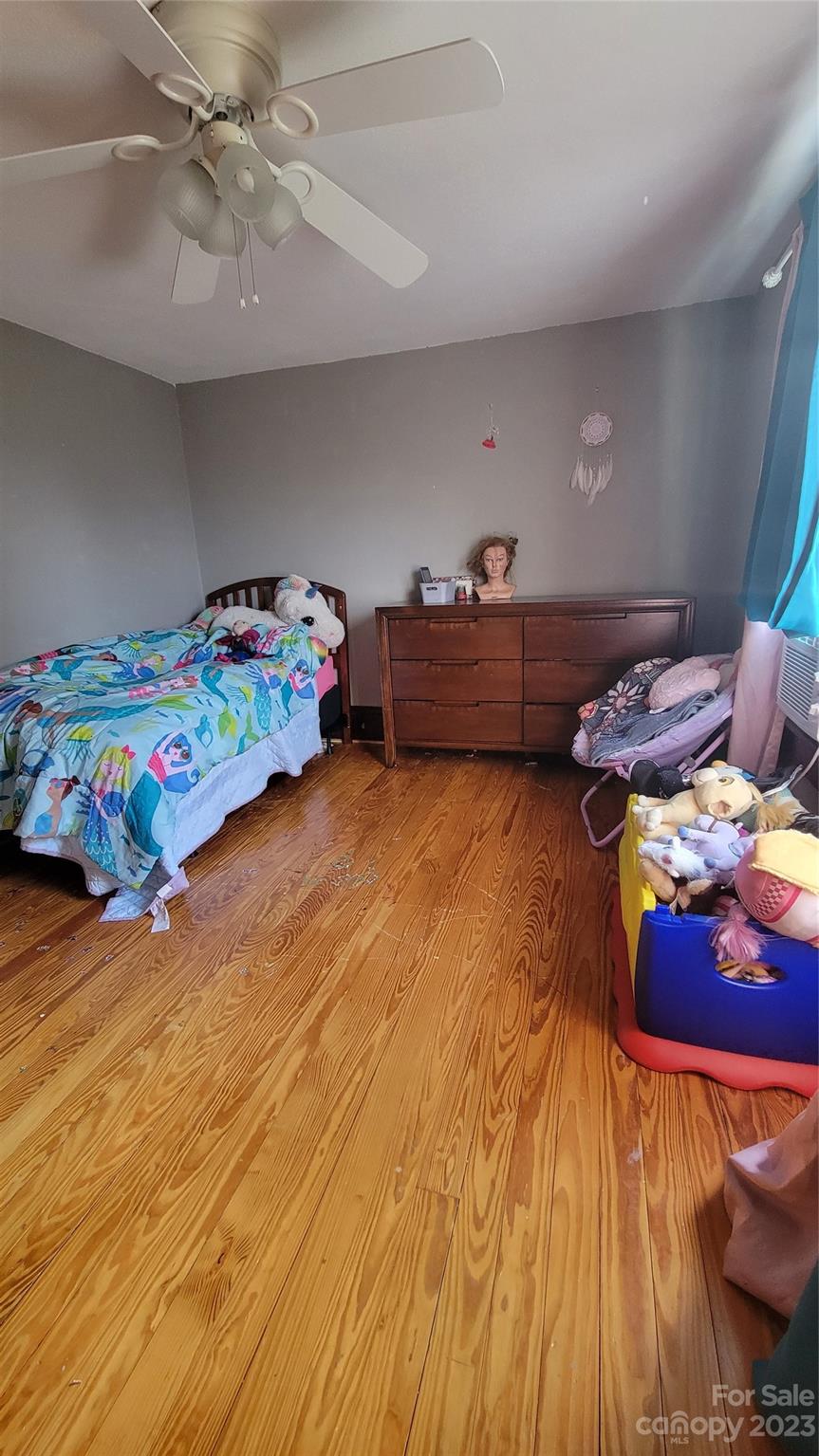 160 Edwards Road Clyde, NC 28721 - Photo 13 of 17 a living room with furniture and a wooden floor