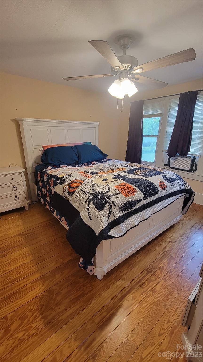 160 Edwards Road Clyde, NC 28721 - Photo 15 of 17 a bedroom with bed and window