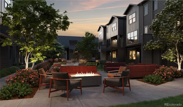 a view of a patio with a table and chairs in patio