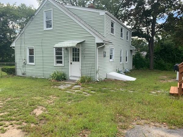53 Moss Road Springfield, MA 01119 - Photo 15 of 15 a front view of a house with garden