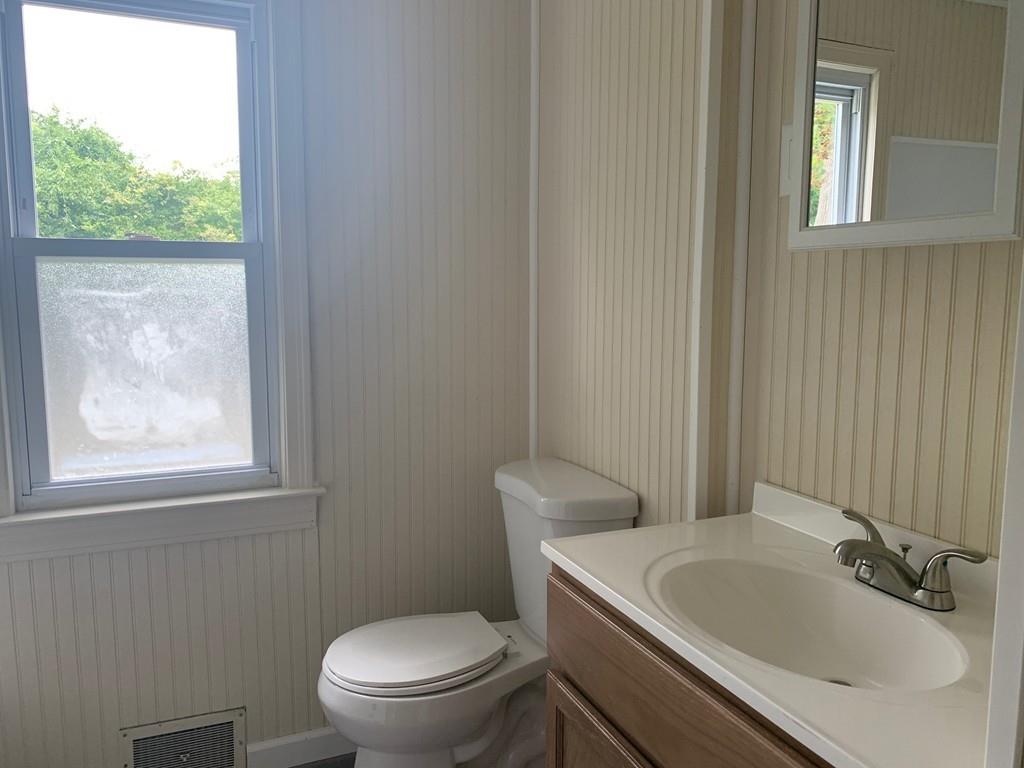 53 Moss Road Springfield, MA 01119 - Photo 10 of 15 a bathroom with a sink and a toilet