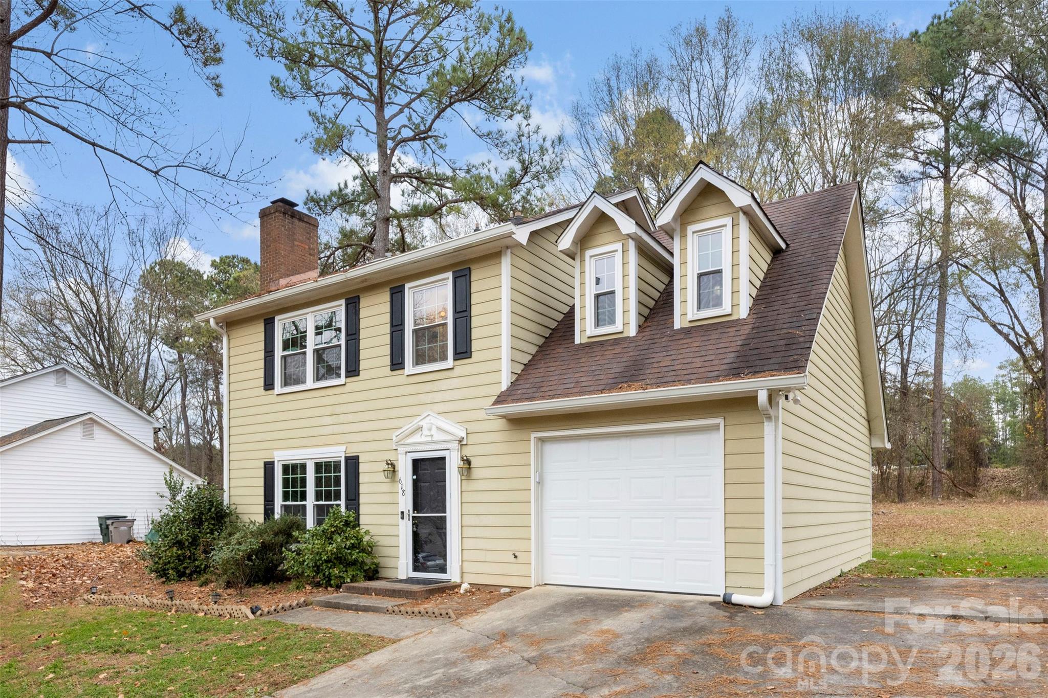 618 Tryon Place Gastonia, NC 28054 - Photo 19 of 32 a front view of a house with garden
