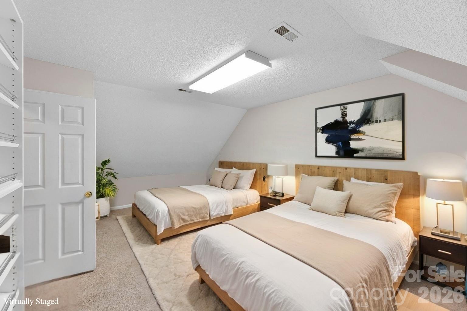 618 Tryon Place Gastonia, NC 28054 - Photo 2 of 32 a bedroom with two beds and painting on the wall