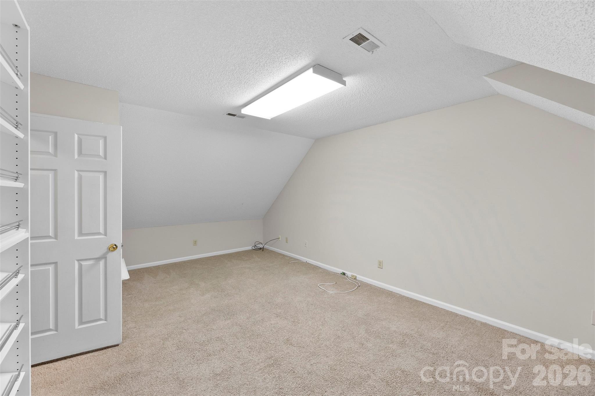 618 Tryon Place Gastonia, NC 28054 - Photo 27 of 32 an empty room with a empty space and windows