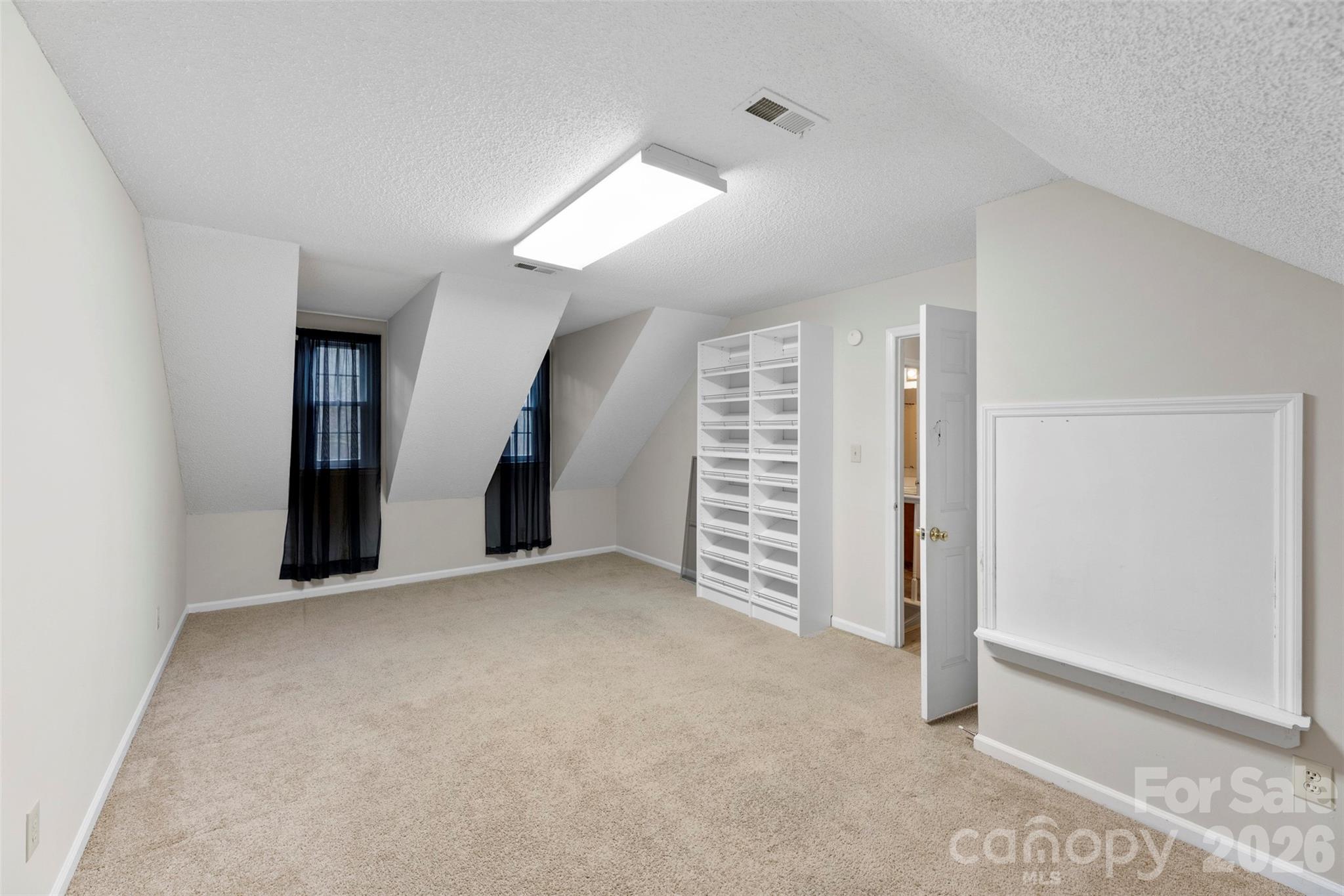 618 Tryon Place Gastonia, NC 28054 - Photo 28 of 32 an empty room with windows and closet