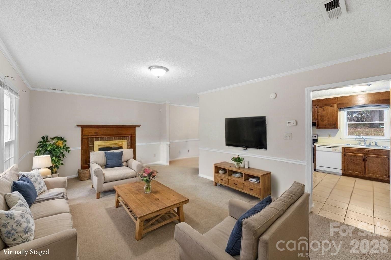 618 Tryon Place Gastonia, NC 28054 - Photo 5 of 32 a living room with furniture and a flat screen tv