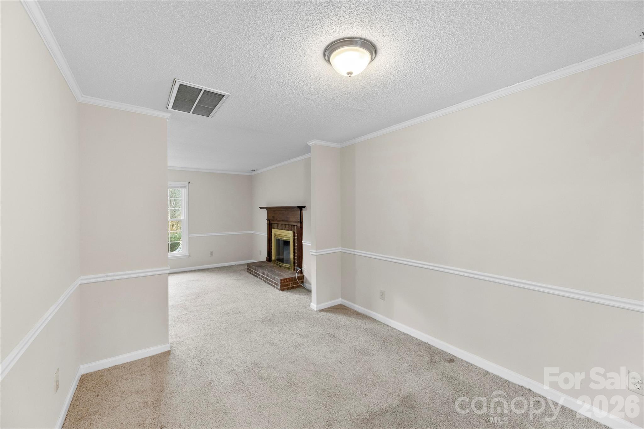 618 Tryon Place Gastonia, NC 28054 - Photo 9 of 32 a view of an empty room with a window