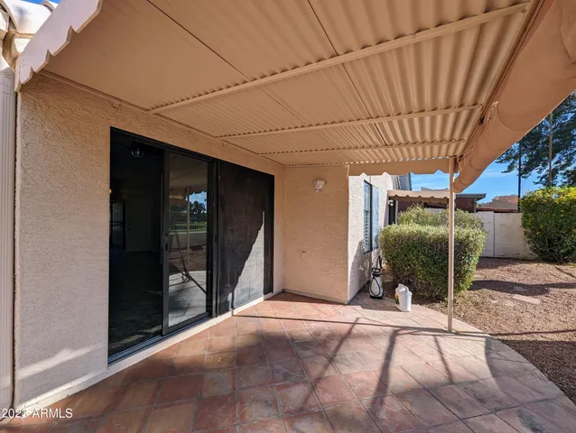 a view of a terrace with chairs