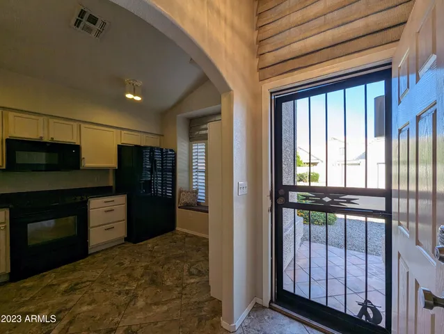 a view of an empty room and window