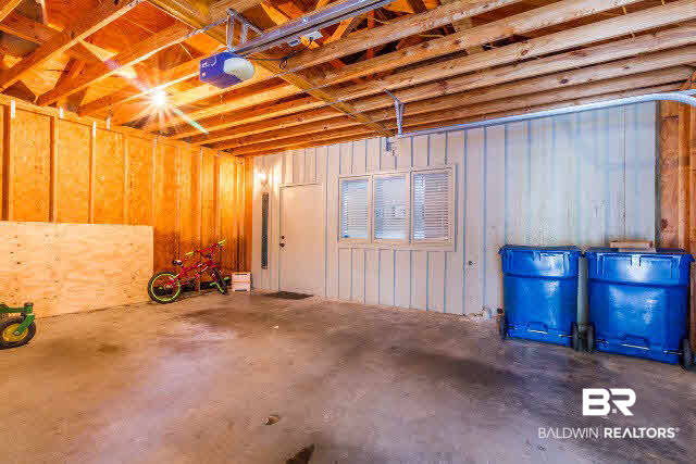 5629 Millhouse Road Gulf Shores, AL 36542 - Photo 33 of 36 There is one other garage on the opposite side of the guest suite.