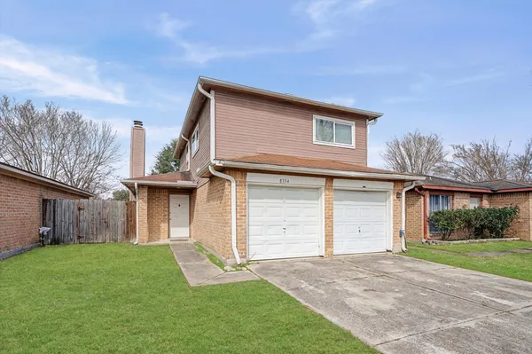 a front view of house with yard