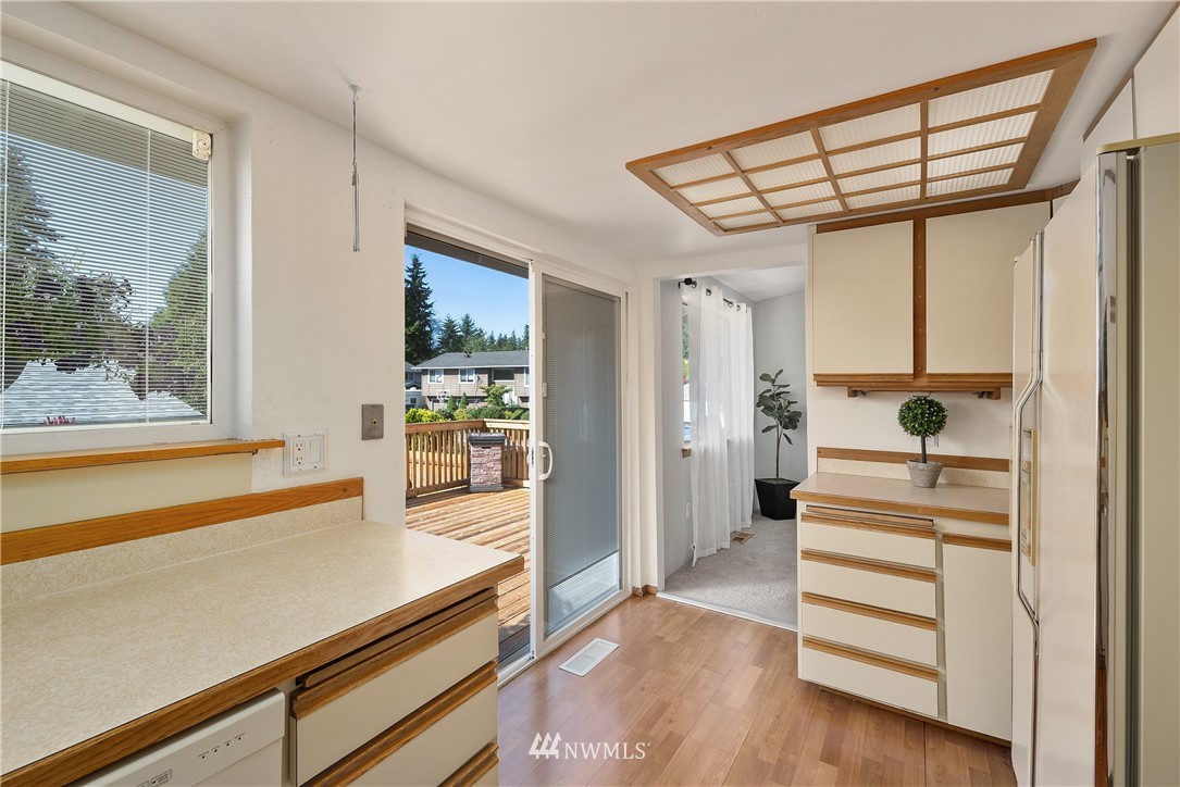 2603 171st Street Southeast Bothell, WA 98012 - Photo 15 of 37 a view of a hallway view with wooden floor and windows
