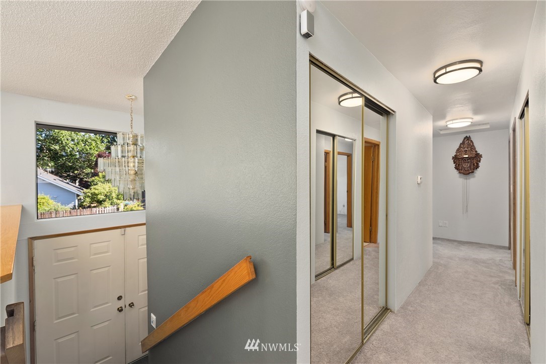 2603 171st Street Southeast Bothell, WA 98012 - Photo 16 of 37 a view of a hallway with windows