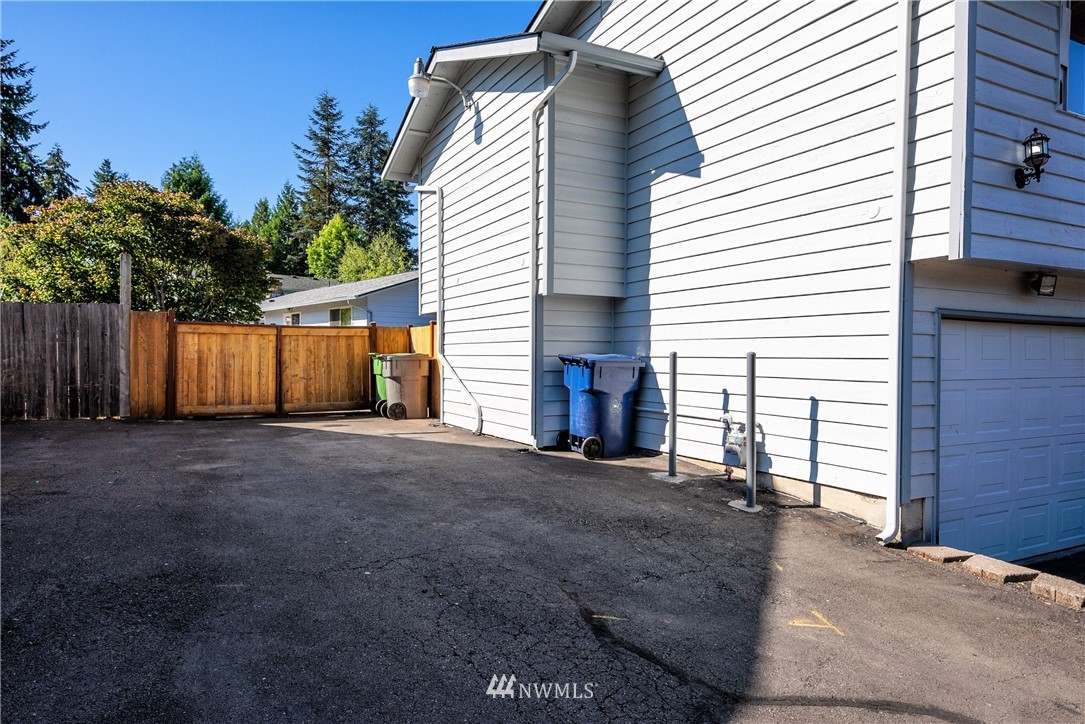 2603 171st Street Southeast Bothell, WA 98012 - Photo 37 of 37 a view of an house with backyard and trees