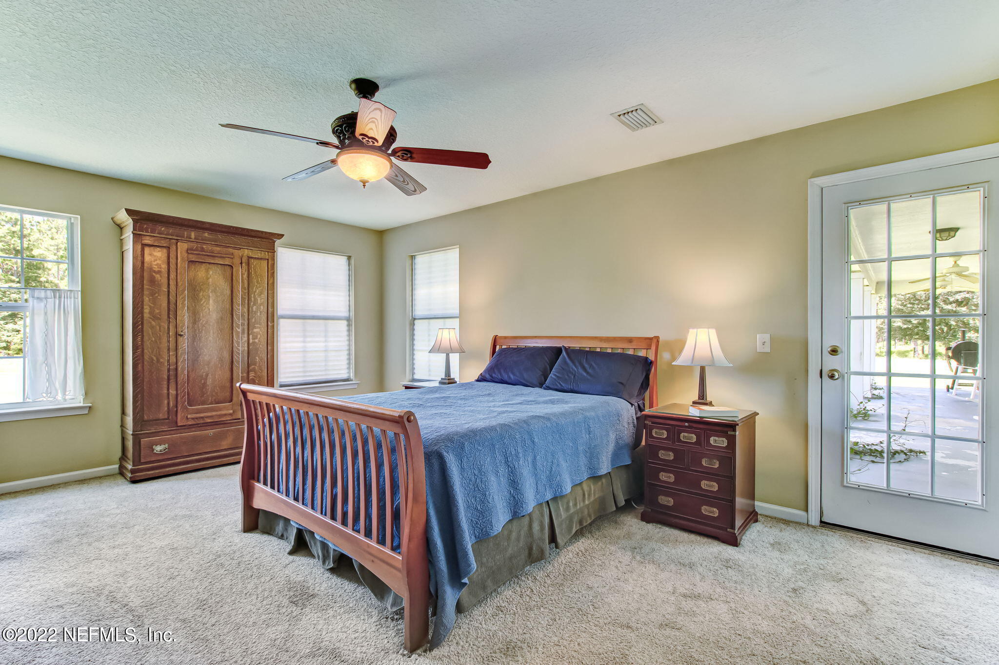 12410 County Road 121 Bryceville, FL 32009 - Photo 15 of 34 a bedroom with bed and wooden floor