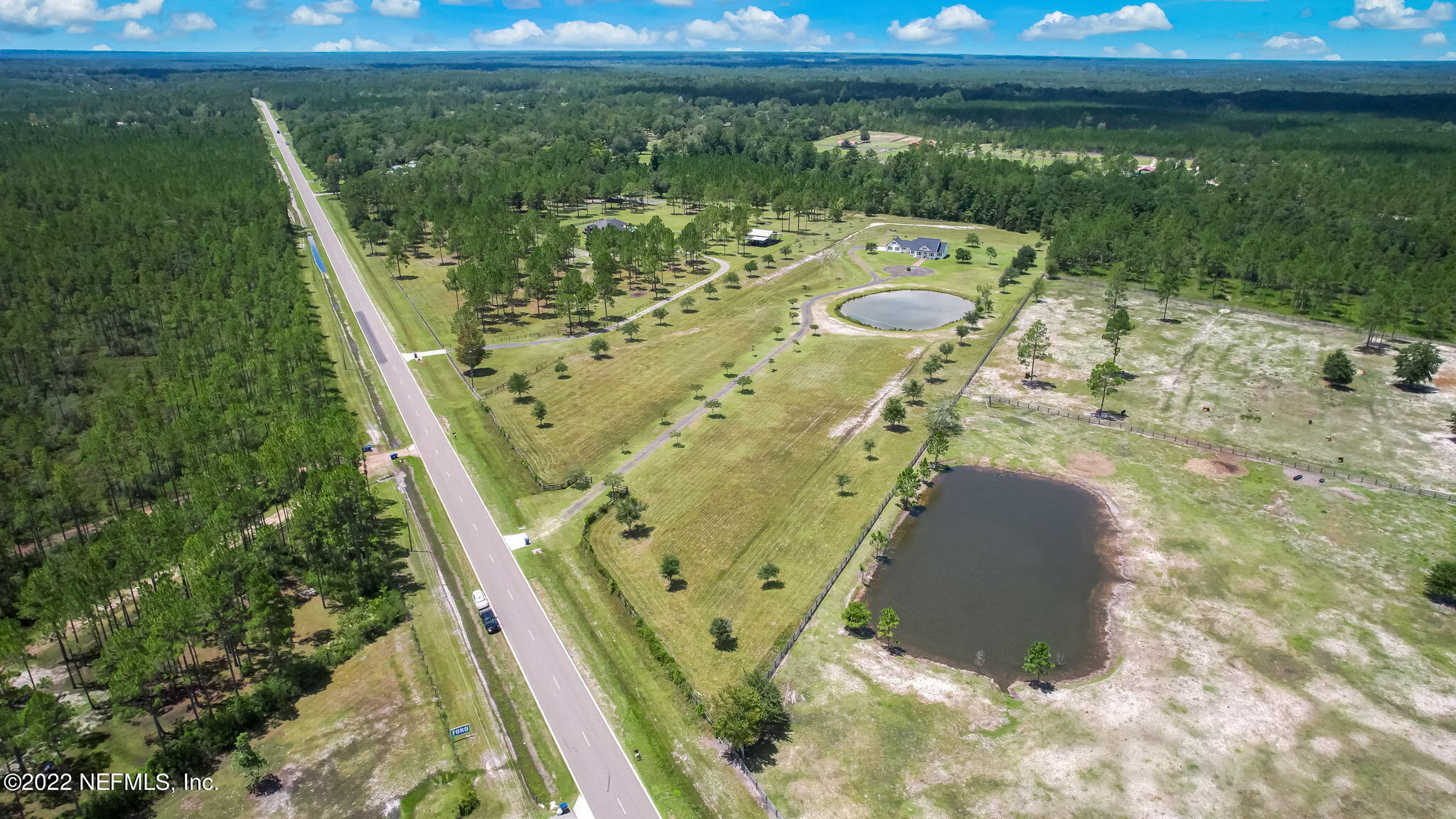 12410 County Road 121 Bryceville, FL 32009 - Photo 21 of 34 a view of a swimming pool with a yard