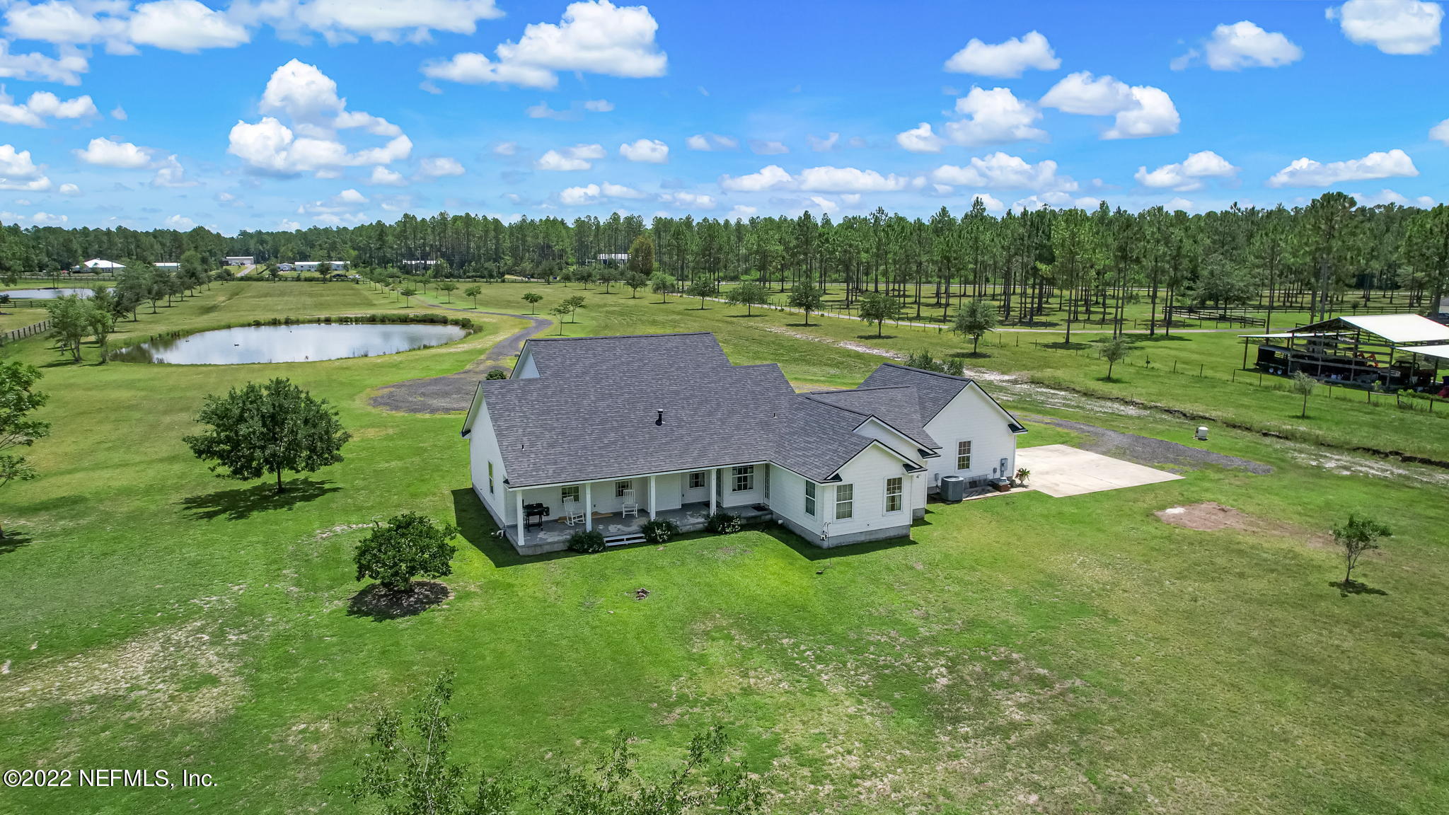 12410 County Road 121 Bryceville, FL 32009 - Photo 22 of 34 a view of a garden with houses