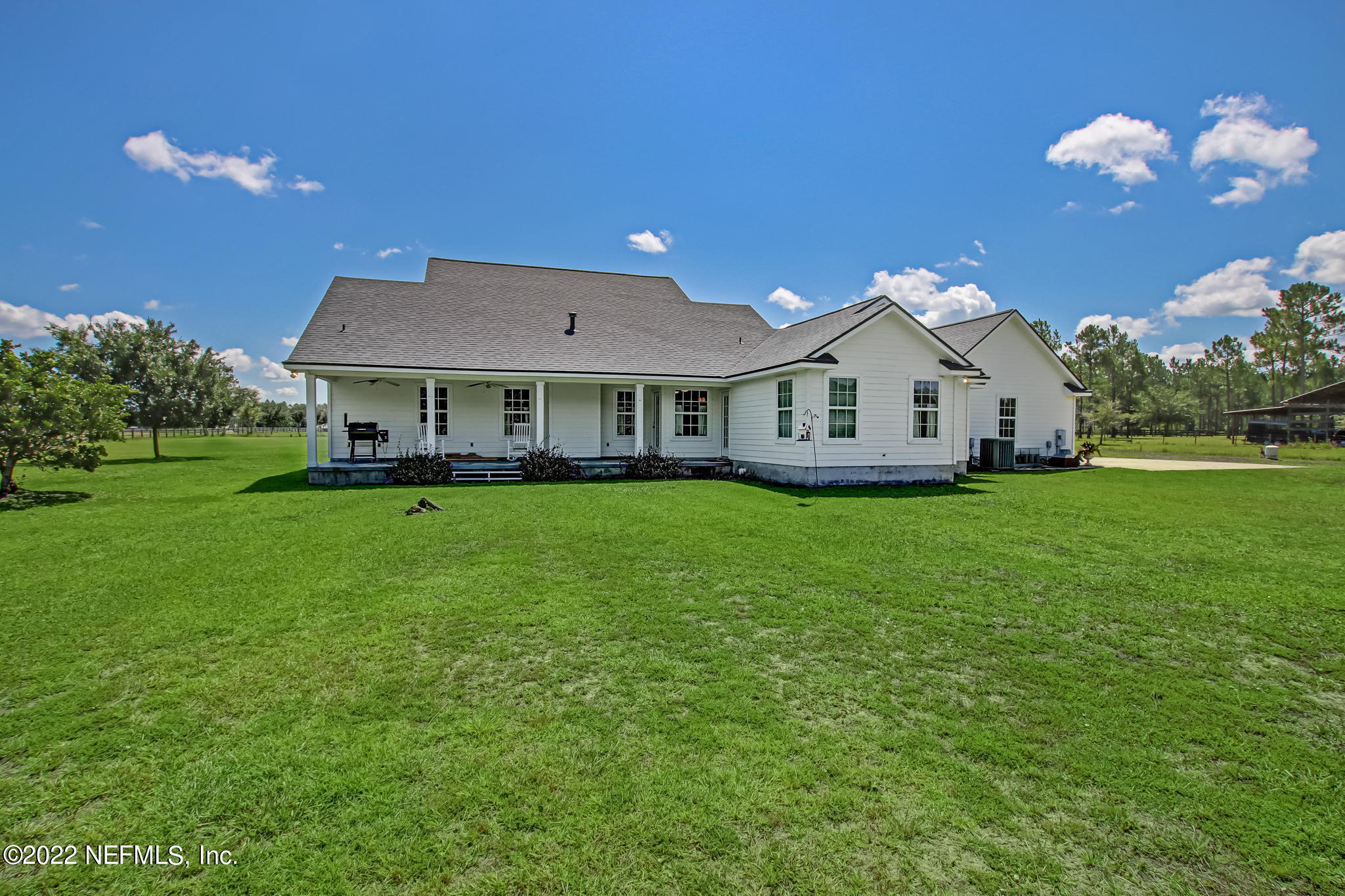 12410 County Road 121 Bryceville, FL 32009 - Photo 24 of 34 a front view of a house with garden
