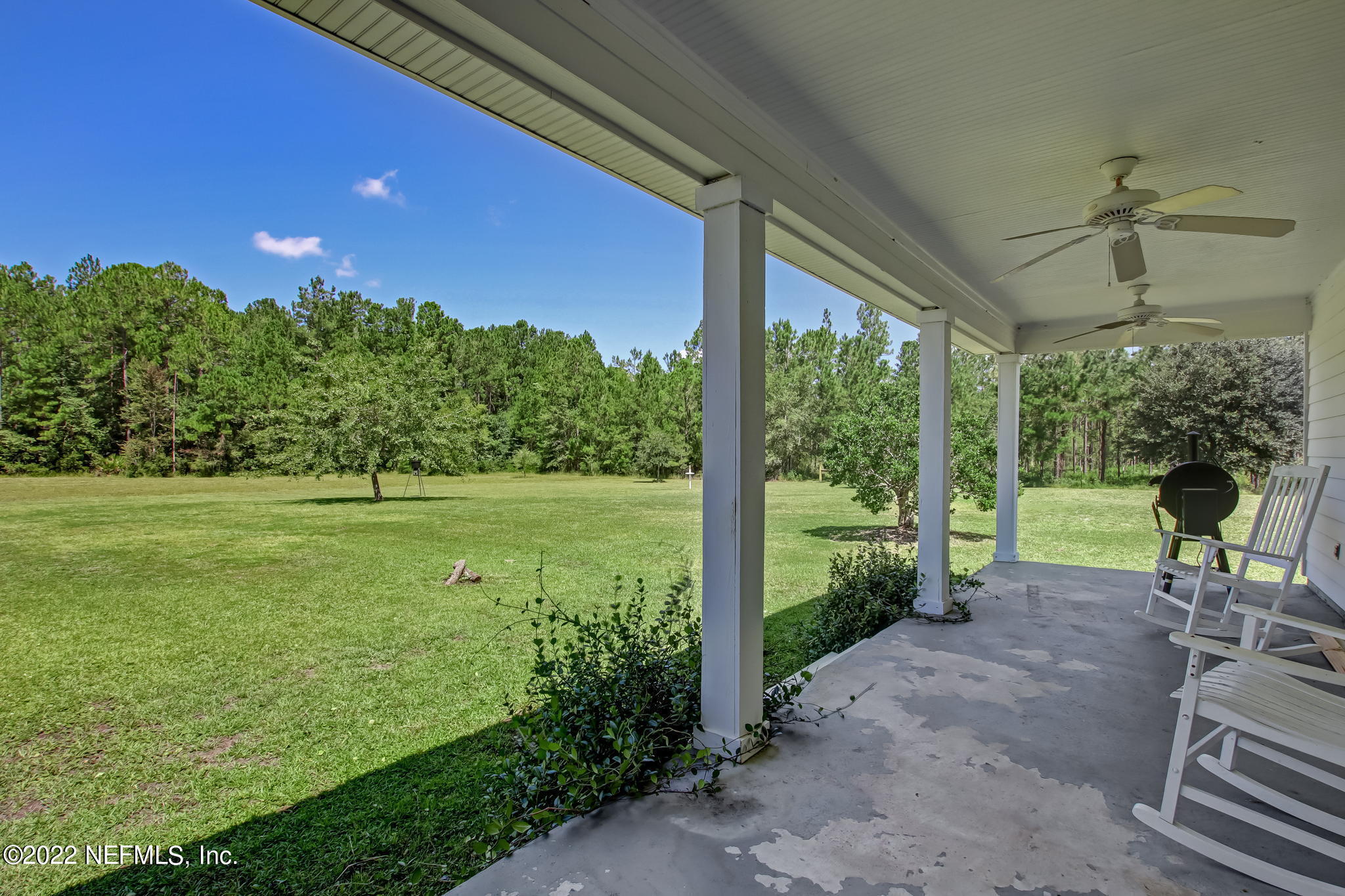 12410 County Road 121 Bryceville, FL 32009 - Photo 28 of 34 a view of a porch with furniture and a yard