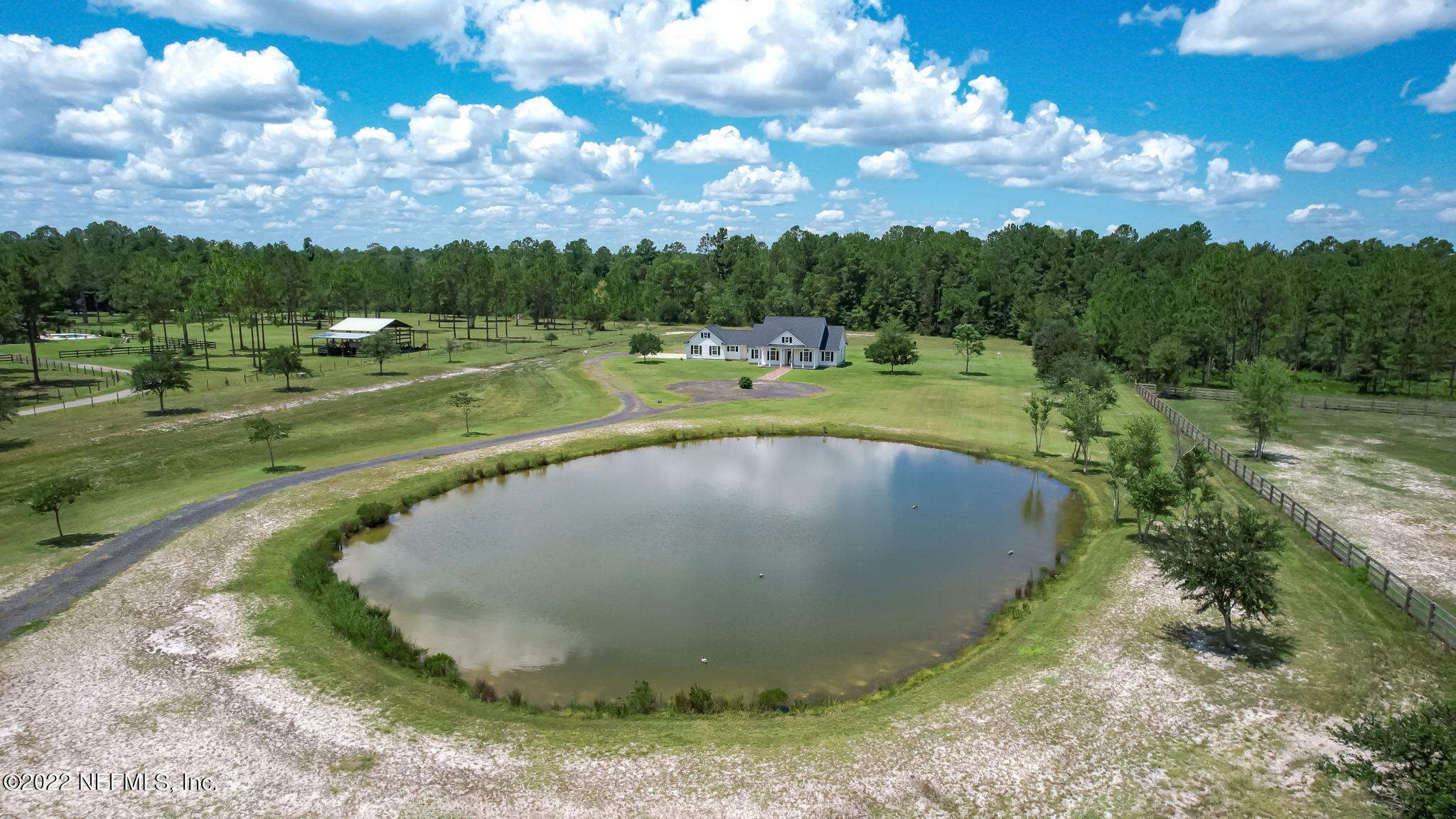 12410 County Road 121 Bryceville, FL 32009 - Photo 29 of 34 a view of a swimming pool with a yard