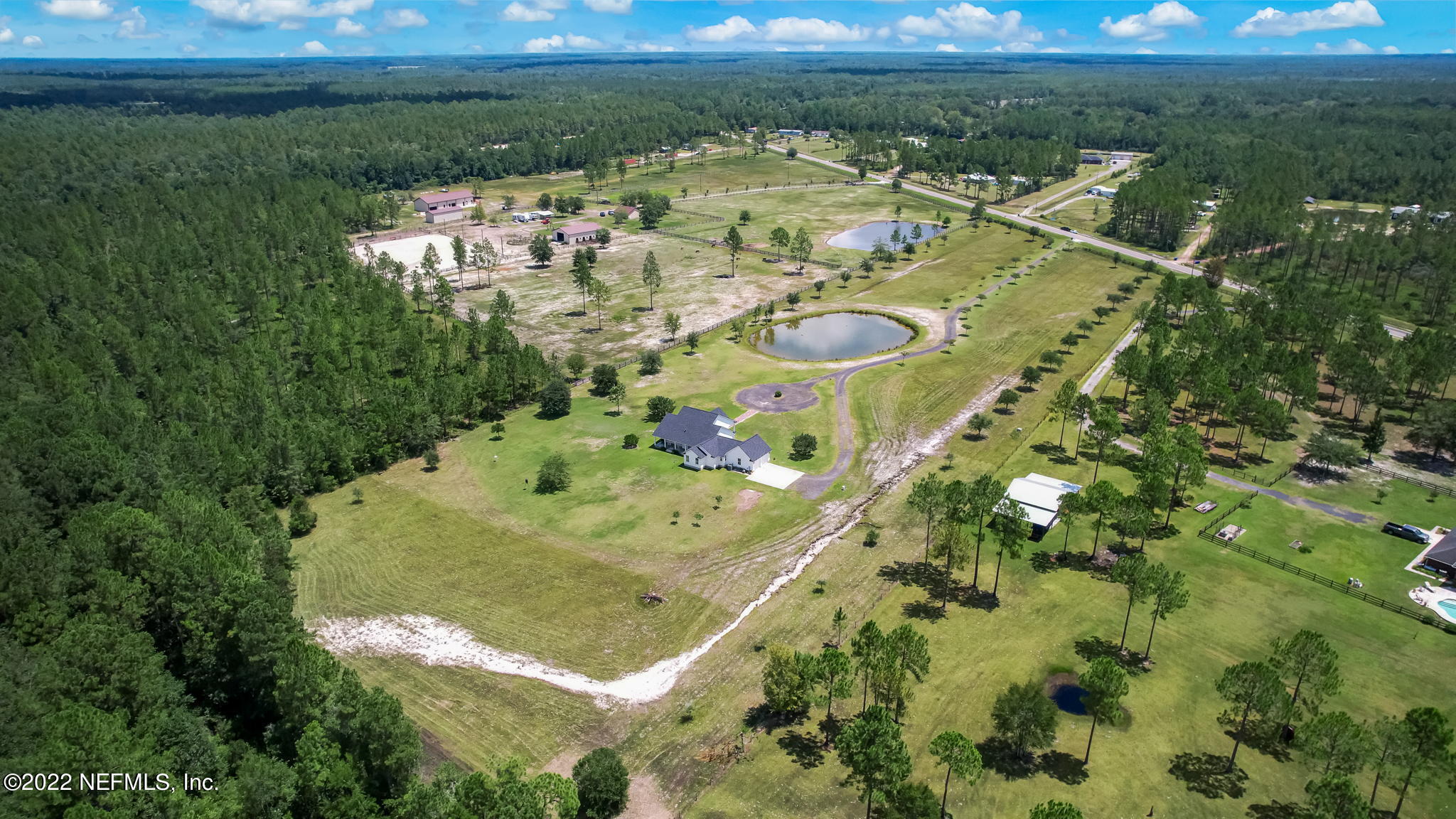 12410 County Road 121 Bryceville, FL 32009 - Photo 3 of 34 a view of a lake with a yard